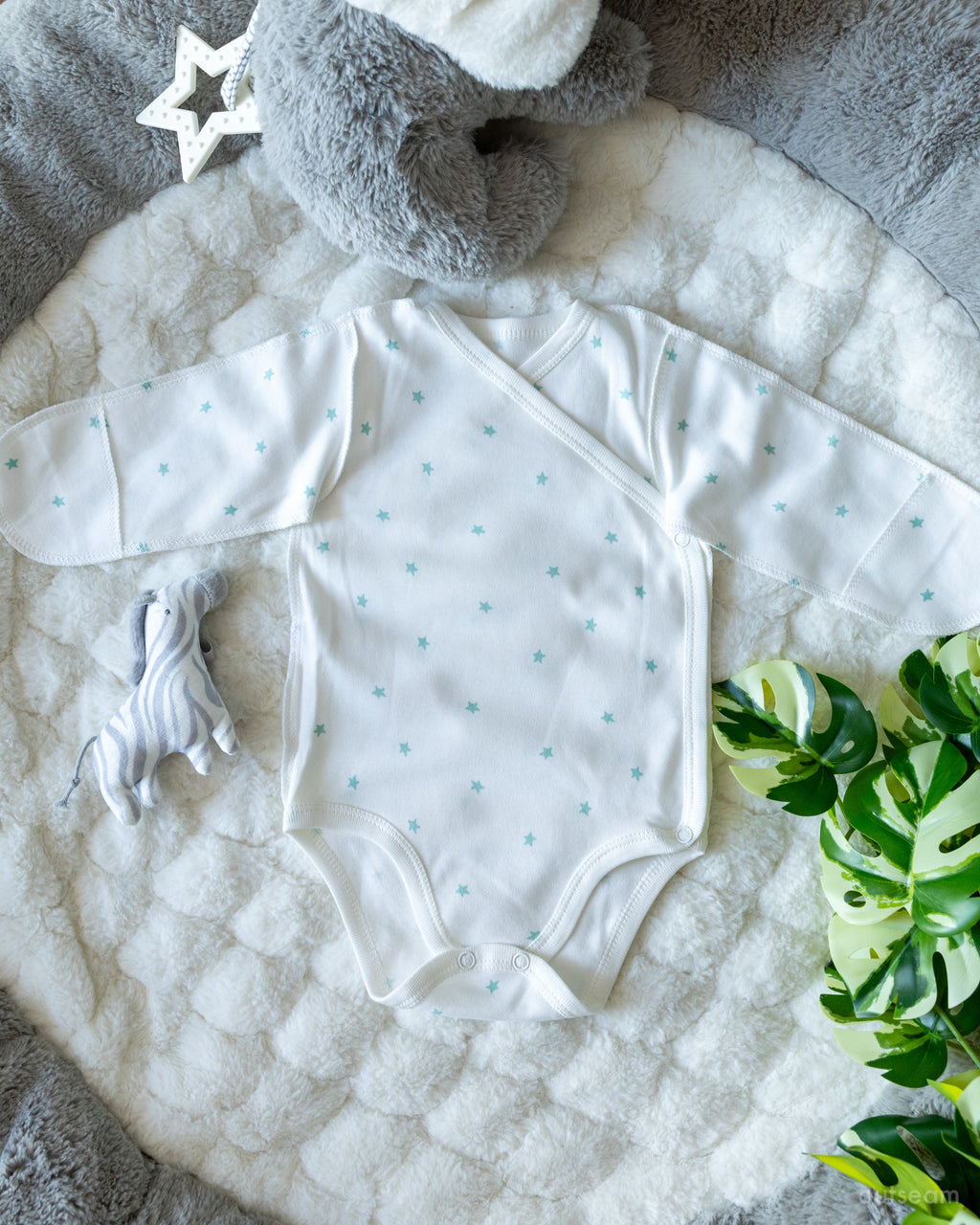 Outseam Bodysuit - Mint Stars — soft cotton baby bodysuit with outward seams